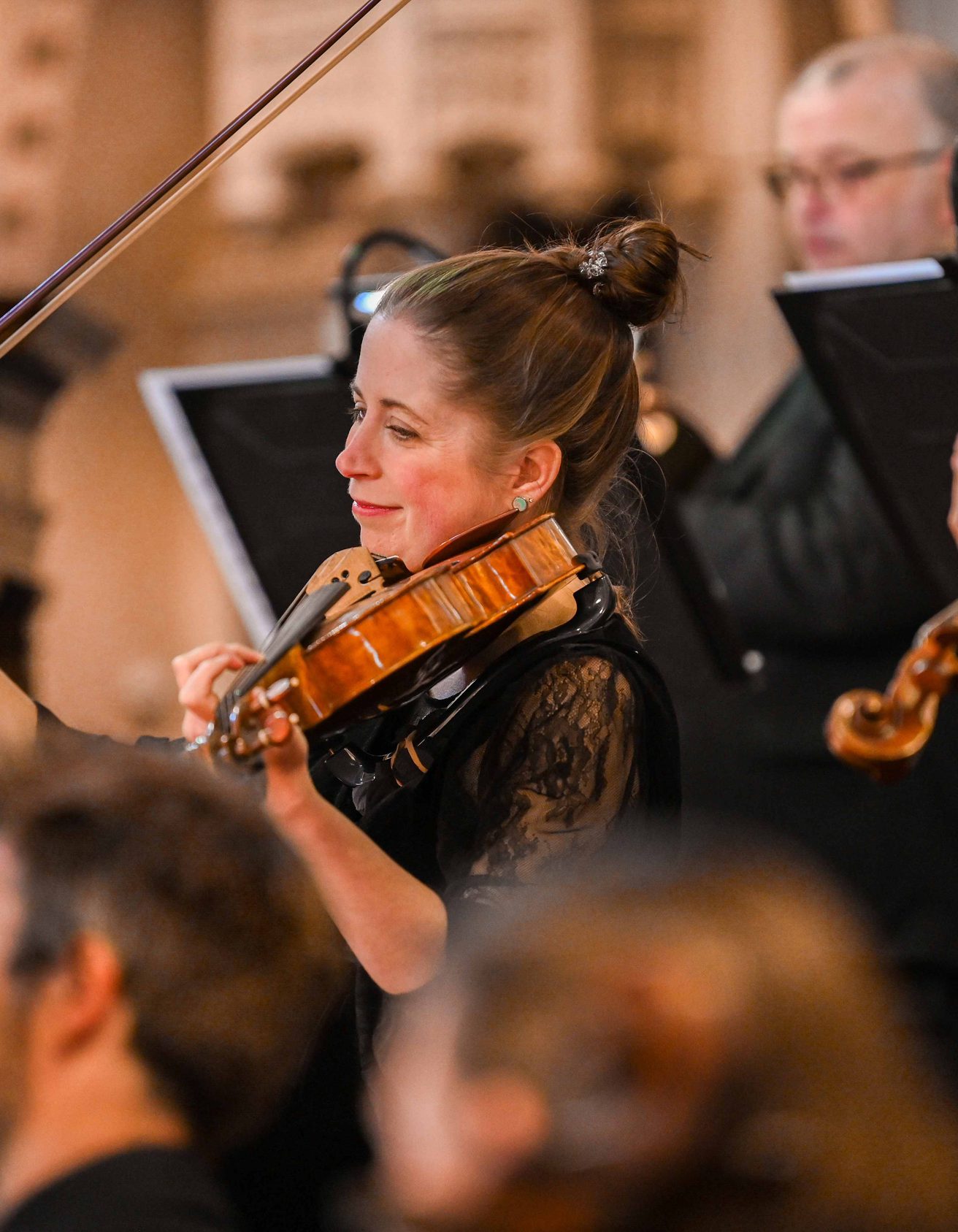 Group of violinists on stage