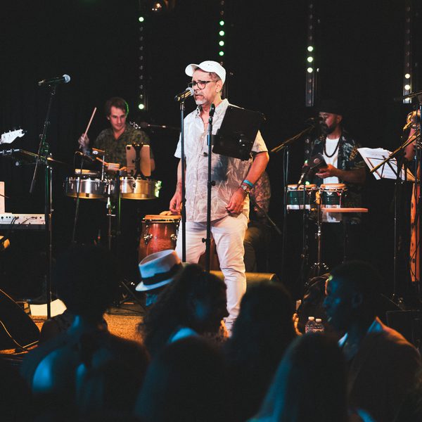 Members of Orchestra Mambo International performing live on stage