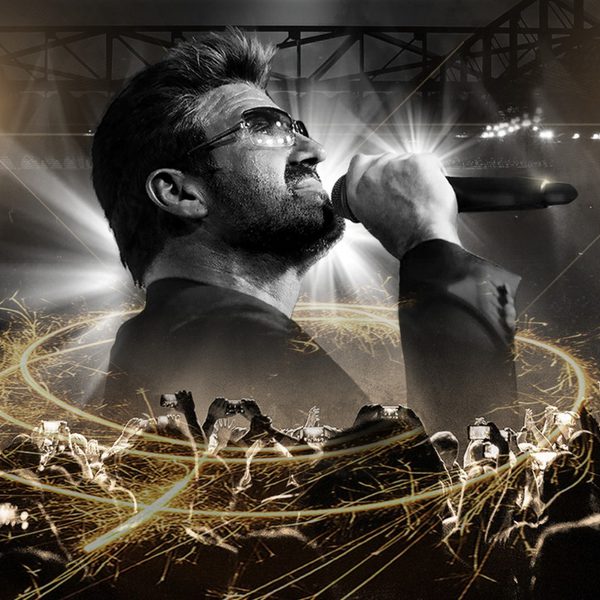 Black and white image of Rob Lamberti dressed as George Michael singing into a microphone surrounded by silhouette of a crowd and gold sparks