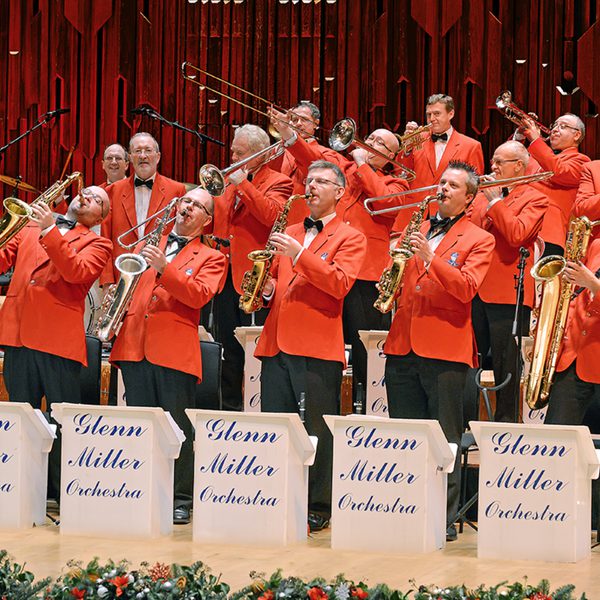 Brass band in red blazers and black bow ties